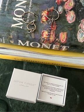 Justine Clenquet Silver Hoop Earrings with Purple Crystal Drops